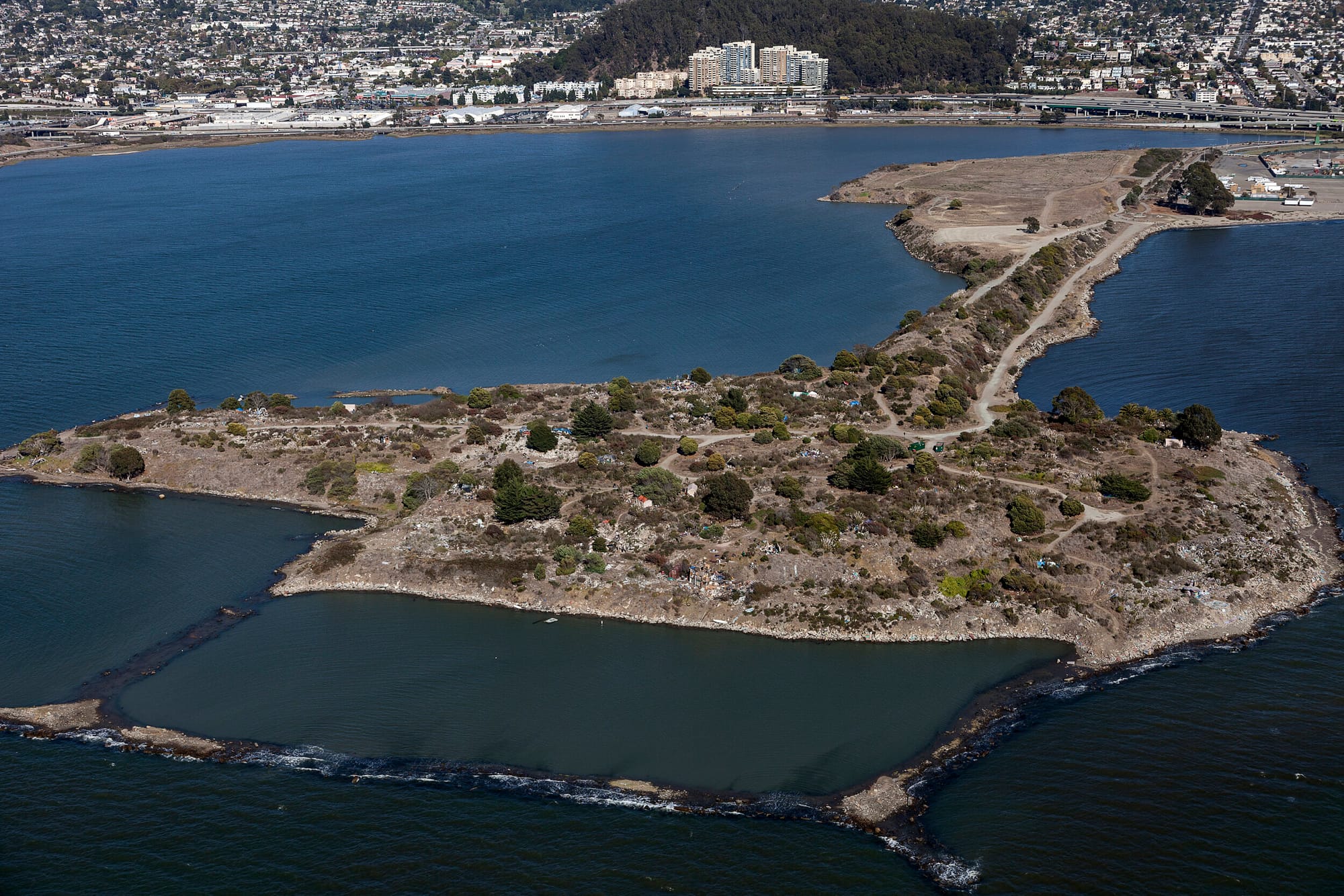 Aerial view of Albany Bulb’s shoreline and trails in the Bay Area.