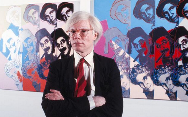 Photo of artist Andy Warhol, creator of the “New York Skyscrapers” series, which was commissioned by Donald Trump.